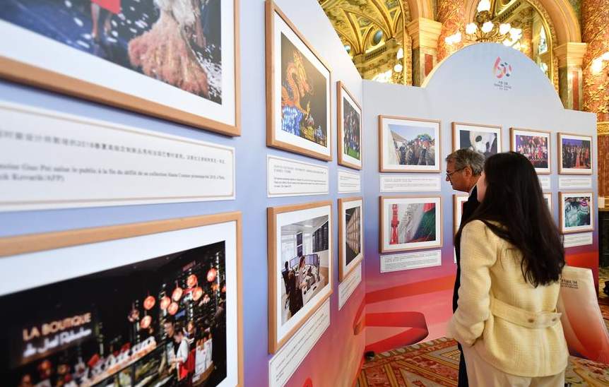 Xinhua, AFP hold photo exhibition marking 60th anniversary of China-France ties