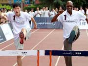 Liu Xiang teaches hurdling skills to middle school students