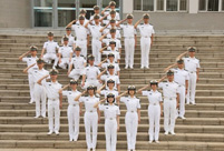 PLA naval cadets toss their hats at graduation ceremony