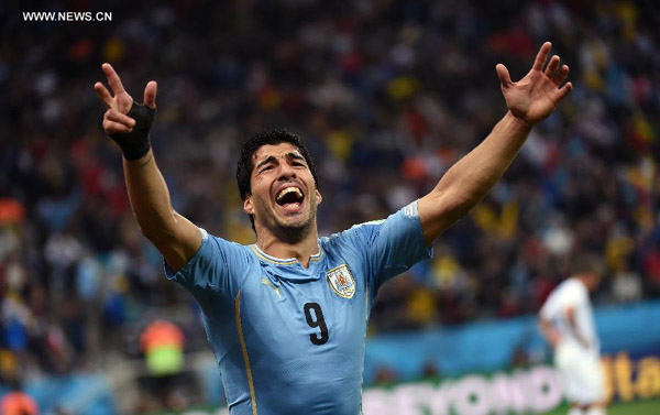 Suarez hits out at critics after sinking England