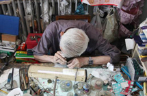 An old man who fixes watches