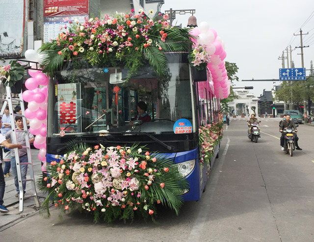 Transforming bus into wedding car, a low carbon consumption pattern