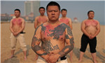 Muscle beach Beat ‘em to the punch at China’s seaside bodyguard school