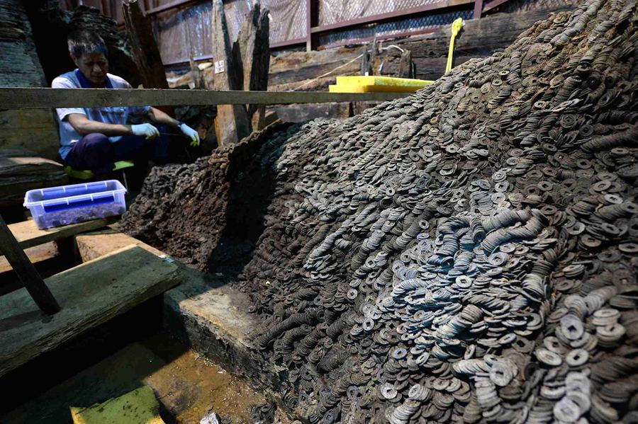 10 tons of copper coins unearthed in 2,000 years old ancient tomb