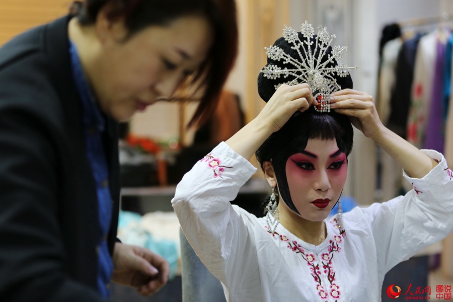 The backstage of a traditional Chinese opera troupe