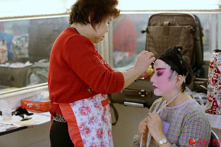 The backstage of a traditional Chinese opera troupe