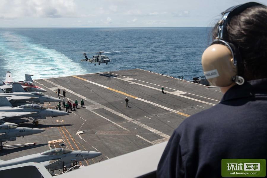 Chinese ships keep close watch on U.S. Navy aircraft carrier strike group in S. China Sea 