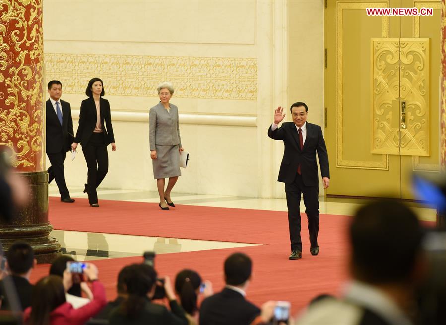 Premier Li Keqiang arrives for press conference