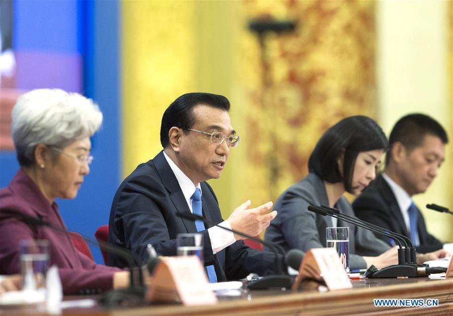 Chinese premier stresses peaceful development of cross-Strait relations
