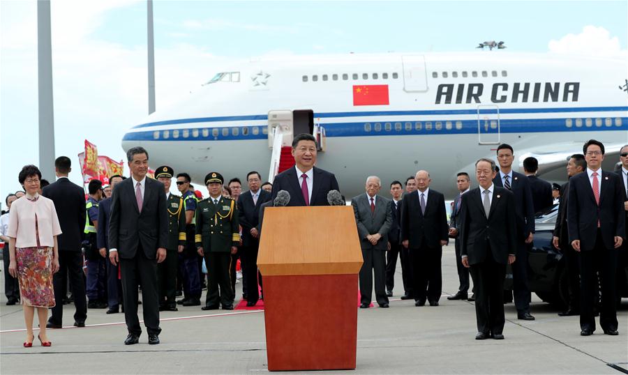 Chinese President Xi Jinping speaks upon his arrival in Hong Kong, south China, June 29, 2017. Xi, also general secretary of the Communist Party of China Central Committee and chairman of the Central Military Commission, is here to attend celebrations marking the 20th anniversary of Hong Kong's return to the motherland, and the inauguration of the fifth-term government of the Hong Kong Special Administrative Region (HKSAR). He will also inspect the HKSAR. (Xinhua/Ma Zhancheng)