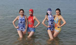 Qingdao’s signature swimwear product attracts more and more Chinese and overseas beachgoers in niche market 