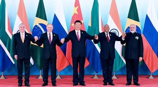Leaders of BRICS countries pose for group photo before summit