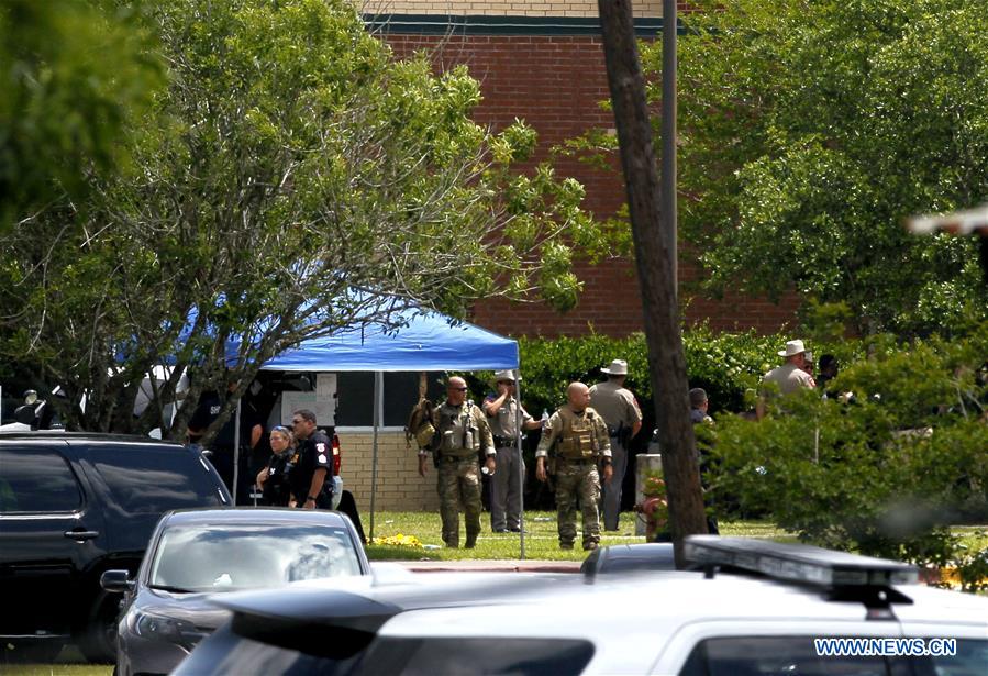 Harris County Sheriff's deputies deploy at Santa Fe High School in Santa Fe, Texas, roughly 30 miles south of Houston, after a shooting on May 18, 2018, that officials said resulted in multiple casualties. [Photo: VCG]
