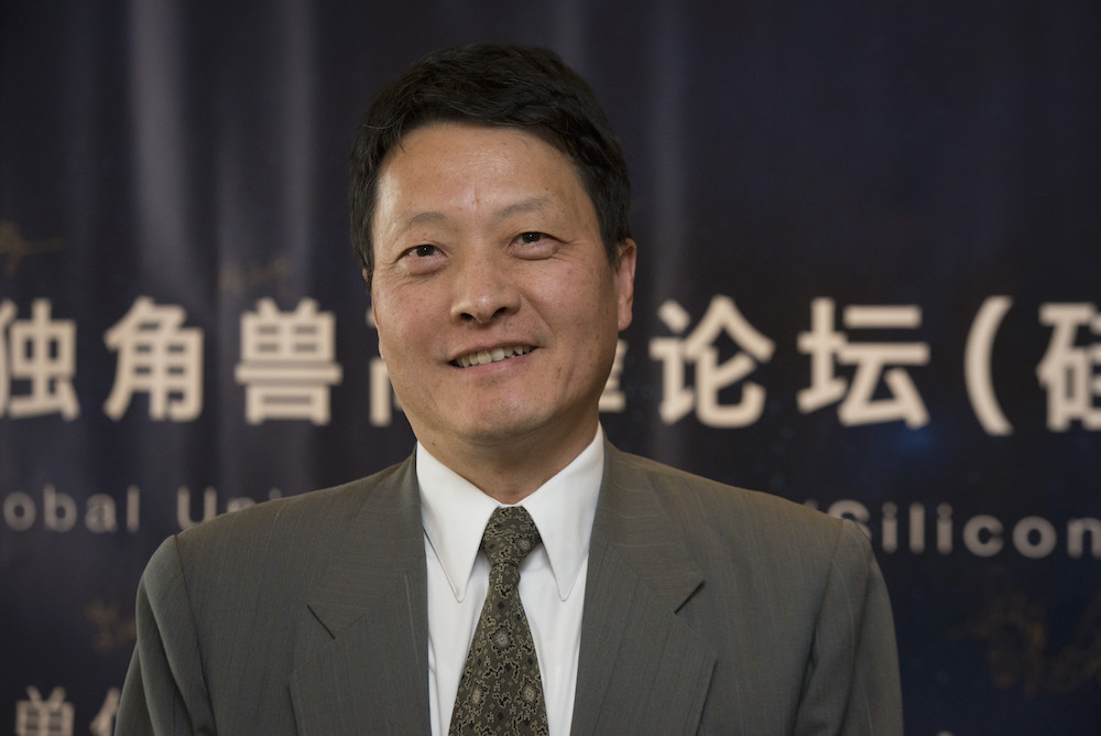 Justin K. Wang, CEO at AXP Technology 