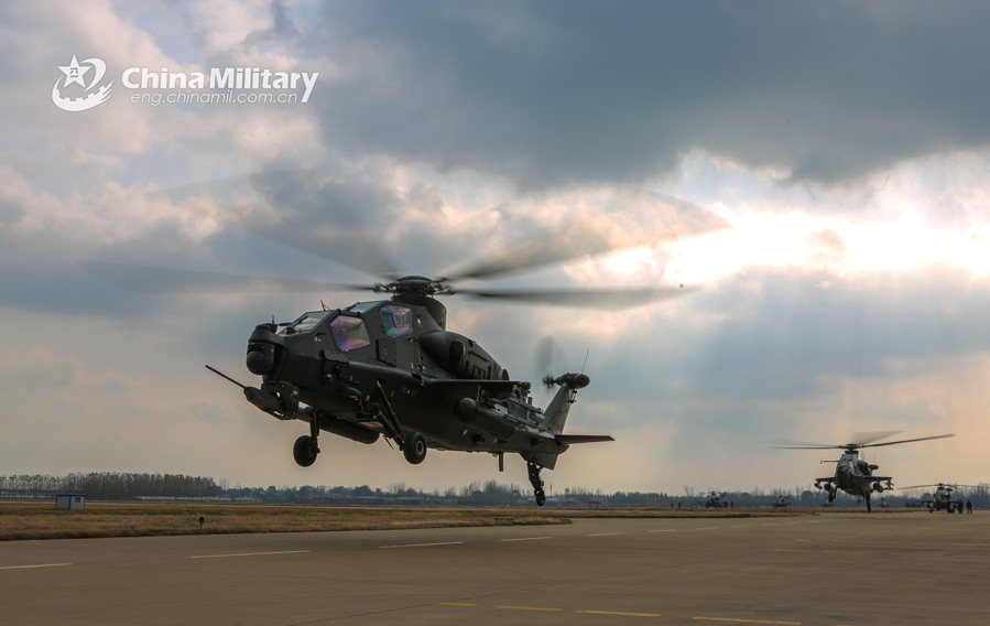 A WZ-10 attack helicopter attached to an army aviation brigade under the PLA 80th Group Army lifts off for a round-the-clock flight training exercise on November 19, 2020. (eng.chinamil.com.cn/Photo by Zhong Deyi)
