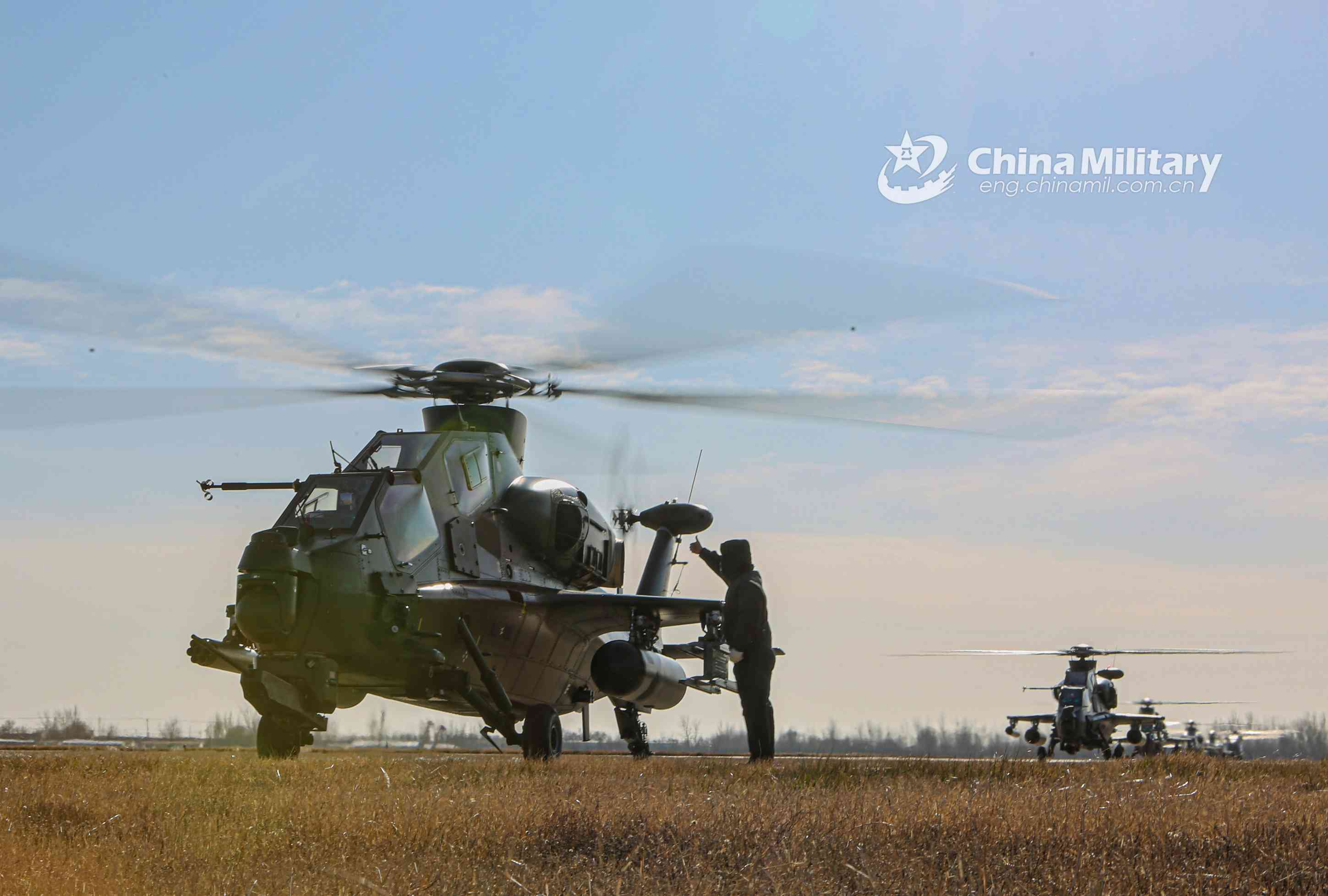 A cluster of WZ-10 attack helicopters attached to an army aviation brigade under the PLA 80th Group Army lift off simultaneously for a tactical flight training exercise on December 13, 2020. (eng.chinamil.com.cn/Lu Yutao)