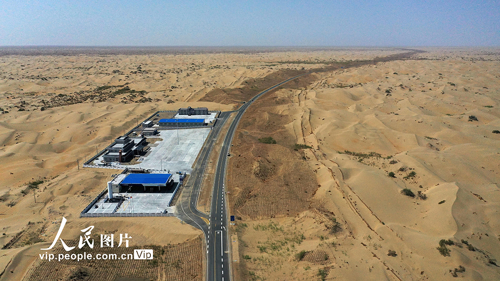 Expressway running across desert to open to traffic in China’s Xinjiang