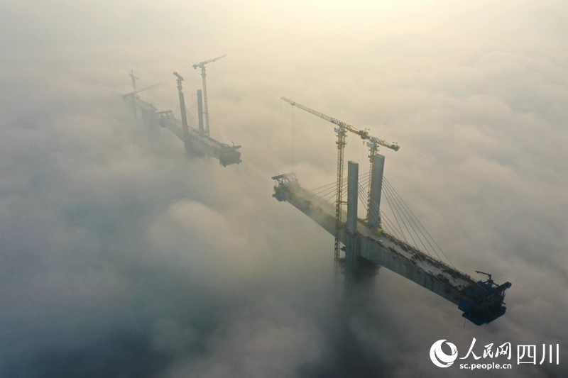A glimpse into construction of super bridge in the clouds in SW China