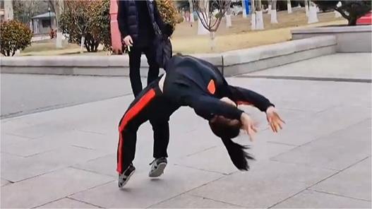 Talented girl performs impressive backflips