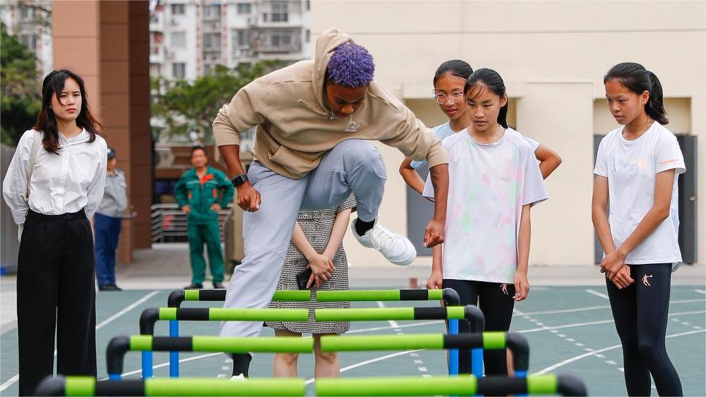 Athletes participate in pre-event school visit activity in Xiamen, China's Fujian