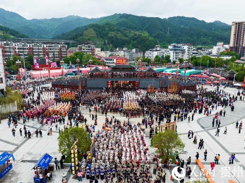 Aerial photo shows formations in a parade for the Miao Sisters Festival in Taijiang county, southwest China's Guizhou Province. (People's Daily Online/Yang Qian)