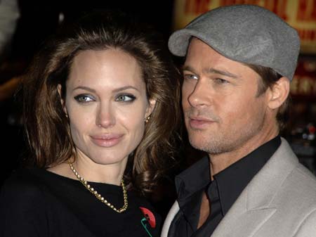 brad pitt and angelina jolie twins 2009. Angelina Jolie and Brad Pitt