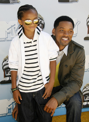 Actor Will Smith and son Jayden pose as they arrive at the 2008 MTV Movie