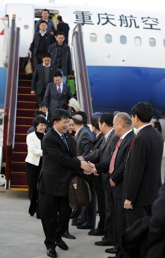 Delegates of the 18th National Congress of the Communist Party of China (CPC) from Chongqing Municipality arrive in Beijing, capital of China, Nov. 5, 2012. The 18th CPC National Congress will be opened in Beijing on Nov. 8. (Xinhua/Xie Huanchi) 