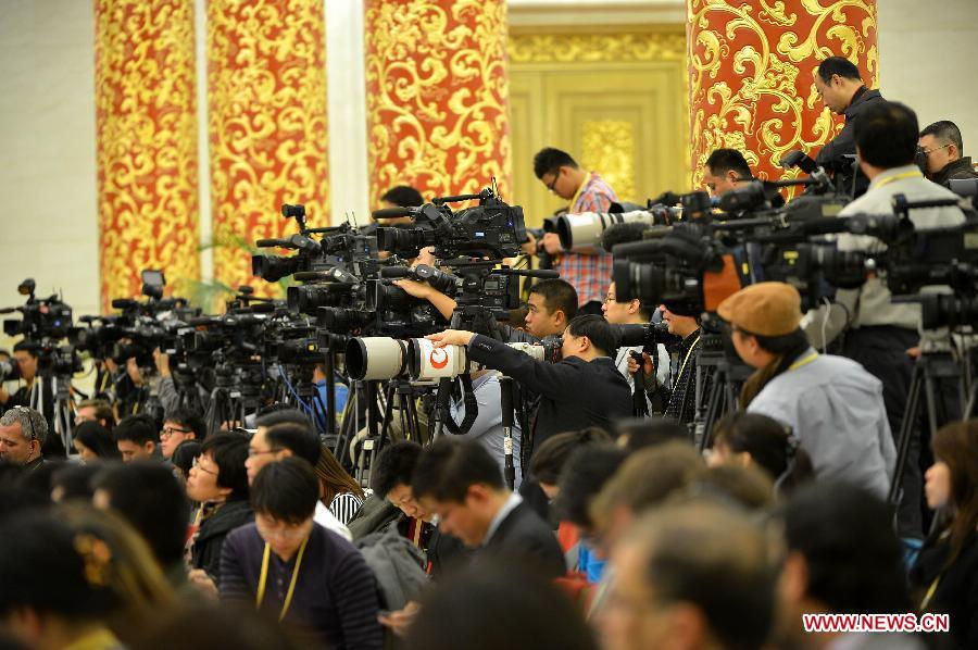 Reporters attend the first press conference of the 18th National Congress of the Communist Party of China (CPC) at the Great Hall of the People in Beijing, capital of China, on Nov. 7, 2012. The 18th CPC National Congress will be opened in Beijing on Thursday. (Xinhua/Li Xin)