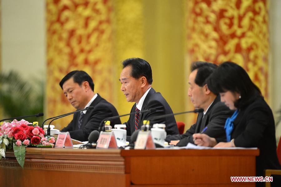 Cai Mingzhao (2nd L), spokesman of the 18th National Congress of the Communist Party of China (CPC), speaks at the first press conference of the 18th CPC National Congress at the Great Hall of the People in Beijing, capital of China, on Nov. 7, 2012. The 18th CPC National Congress will be opened in Beijing on Thursday. (Xinhua/Li Xin)