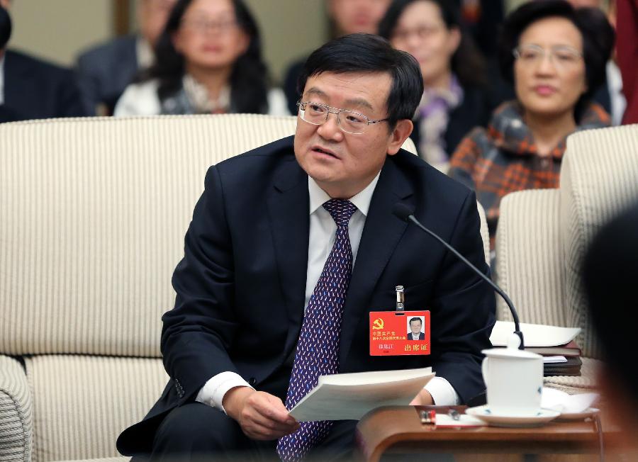 Xu Lejiang, a member of the Shanghai delegation of the 18th National Congress of the Communist Party of China (CPC), speaks at the delegation's panel discussion in Beijing, capital of China, Nov. 10, 2012. (Xinhua/Lan Hongguang)