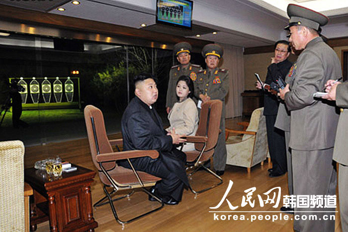 Kim Jong Un, top leader of the Democratic People's Republic of Korea (DPRK) and his wife Ri Sol Ju watch a women's volleyball match between the Pongae team and the Pyongyang team, according to the country's official news agency KCNA's report on Nov.7, 2012. (KCNA)