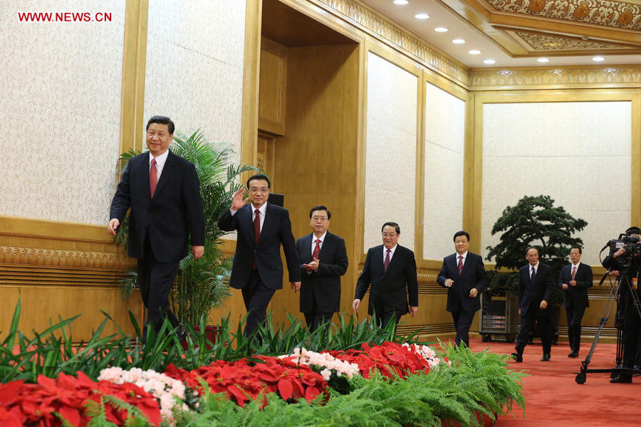 Xi Jinping, Li Keqiang, Zhang Dejiang, Yu Zhengsheng, Liu Yunshan, Wang Qishan, Zhang Gaoli, who have been elected members of the Standing Committee of the Political Bureau of the 18th Central Committee of the Communist Party of China (CPC), arrive to meet with Chinese and foreign journalists at the Great Hall of the People in Beijing, capital of China, Nov. 15, 2012. (Xinhua/Ding Lin )