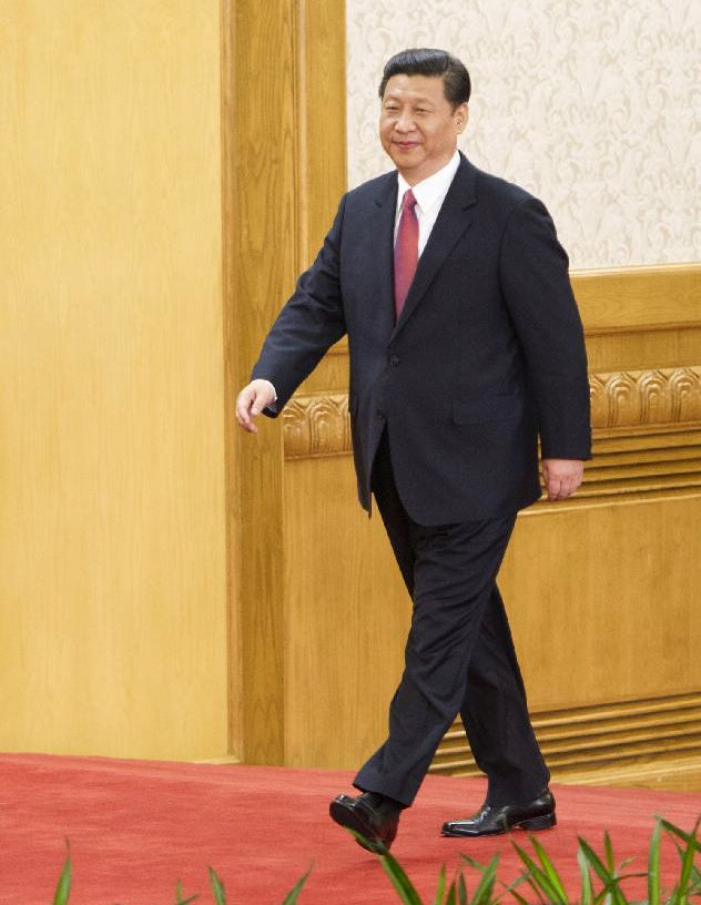 Xi Jinping, general secretary of the Central Committee of the Communist Party of China (CPC), arrives to meet the press at the Great Hall of the People in Beijing, capital of China, Nov. 15, 2012. Xi led the other newly-elected members of the Standing Committee of the 18th CPC Central Committee Political Bureau to meet the press here on Thursday. (Xinhua/Huang Jingwen)