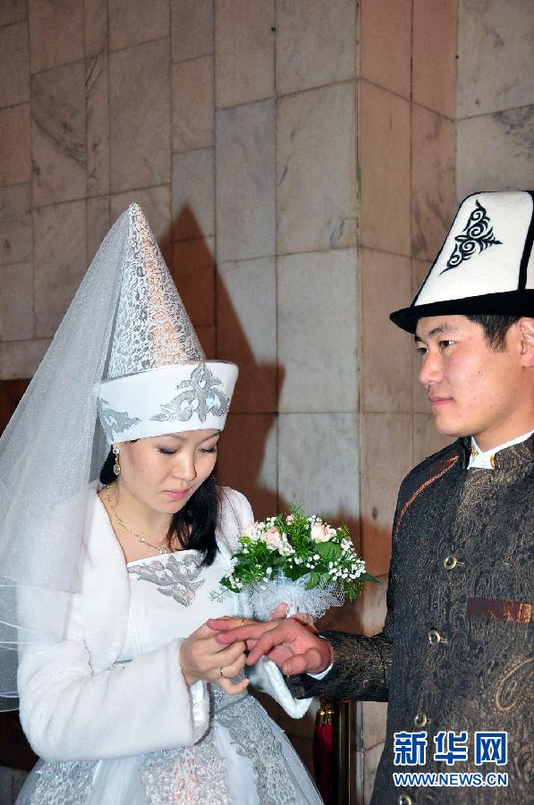 Couple in Traditional Wedding Dress in Kyrgyzstan - en 