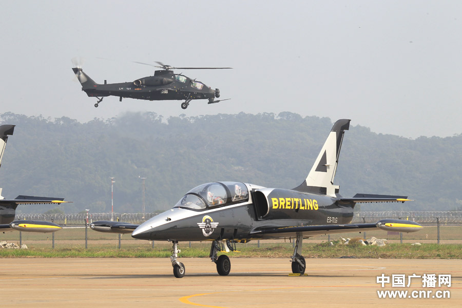 A WZ-10 attack helicopter practices on the first day of Airshow China 2012, which kicked off in south China’s Zhuhai on Nov. 13, 2012, after its first public appearance on Nov. 11, 2012. WZ-10, nicknamed China’s “Apache”, is the most advanced attack helicopter of the PLA and also the most expected Chinese aircraft at the Airshow China 2012. (CNR/Xu Ao)