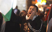 Palestinians protest against Israeli airstrikes