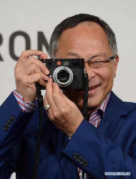 Director Johnnie To takes photos at the photo-call of the film "Drug War" at the 7th Rome Film Festival in Rome, capital of Italy, on Nov. 15, 2012. (Xinhua/Wang Qingqin)
