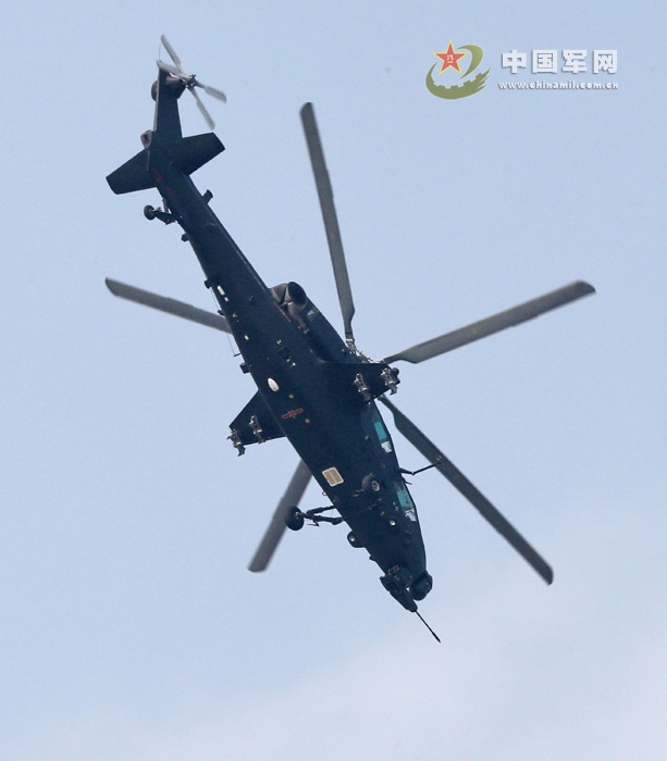 China's independently-developed WZ-10 armed helicopter debuted at the 9th China International Aviation & Aerospace Exhibition in Zhuhai, south China's Guangdong province on November 13, 2012, and showed its good performance in the demonstration. The photo shows that a WZ-10 armed helicopter is vertically attacking the ground target. (chinamil.com.cn/Qiao Tianfu)