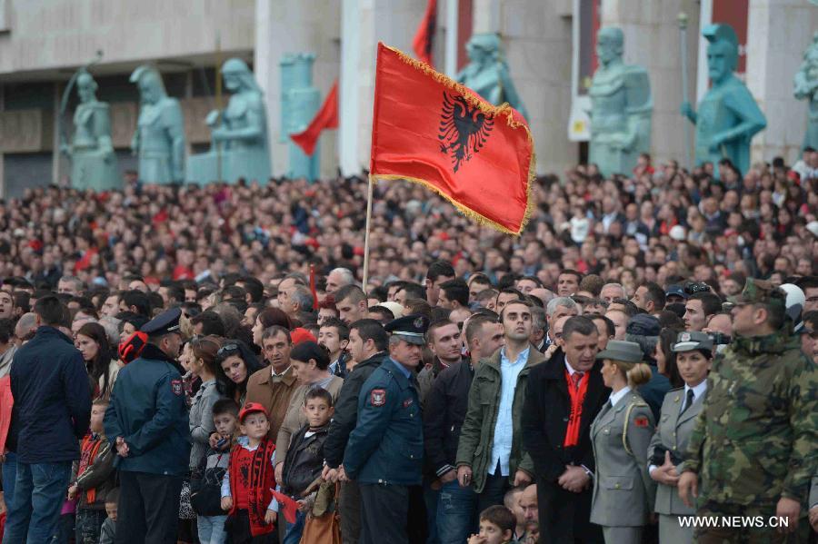 Albanian people take part in the celebration marking the country's 100th anniversary of independence, in Tirana, Albania, Nov. 28, 2012. (Xinhua/Gent Dodoveci) 