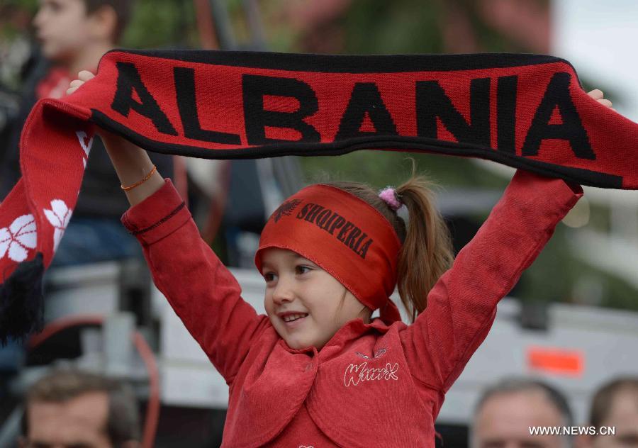 Albanian people take part in the celebration marking the country's 100th anniversary of independence, in Tirana, Albania, Nov. 28, 2012. (Xinhua/Liu Lihang) 