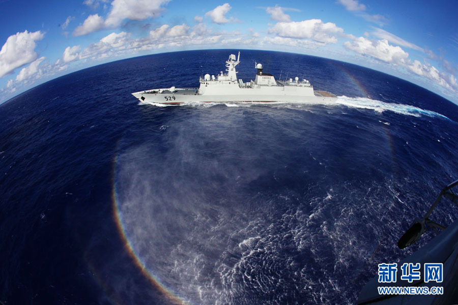 A fleet of the Navy of the Chinese People's Liberation Army (PLA) conducts search and rescue drills with a helicopter, in the western Pacific Ocean on December 1, 2012. (Xinhua/Sun Yanxin)