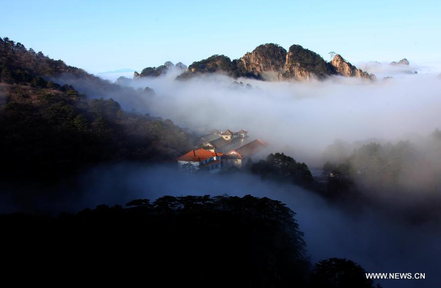 Photo taken on Dec. 2, 2012 shows the sea of clouds after a rainfall at Huangshan Mountain scenic spot in Huangshan City, east China's Anhui Province. (Xinhua/Shi Guangde)