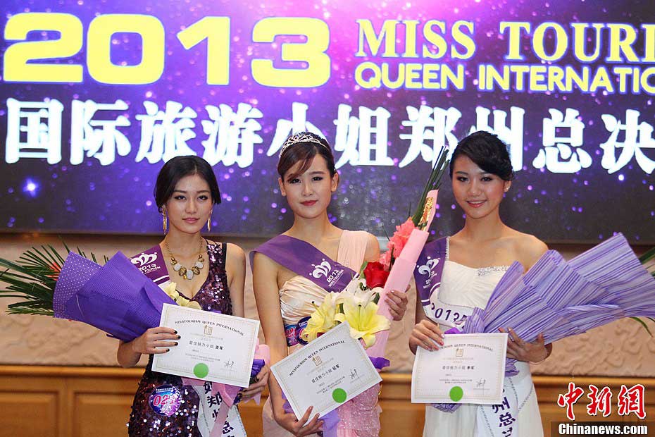 Winners pose for a photo at the final of Miss Charm 2013 of Miss Tourism Queen International 2013 (Henan Section) held in Zhengzhou, Henan Province on Nov. 30, 2012.(CNSPHOTO/Wang Zhongju)