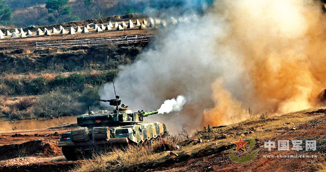 The confrontation-training discussion and exchange activity of the Chinese People's Liberation Army (PLA) was held on November 27, 2012 at the Sanjie Training Base of the Nanjing Military Area Command (MAC) of the PLA, while an armored brigade and a mechanized infantry brigade were conducting a laser-simulation actual-troop confrontation and live-ammunition testing exercise under information conditions. A tank is firing while moving ahead.(PLA Daily/Qiao Tianfu, Zhang Junrong, Liu Feng'an and Shao Zhonghong)