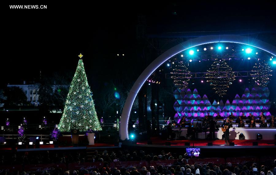 Artists perform during the ceremony of lighting the National Christmas Tree in Washington D.C, the United States, on Dec. 6, 2012. (Xinhua/Fang Zhe)