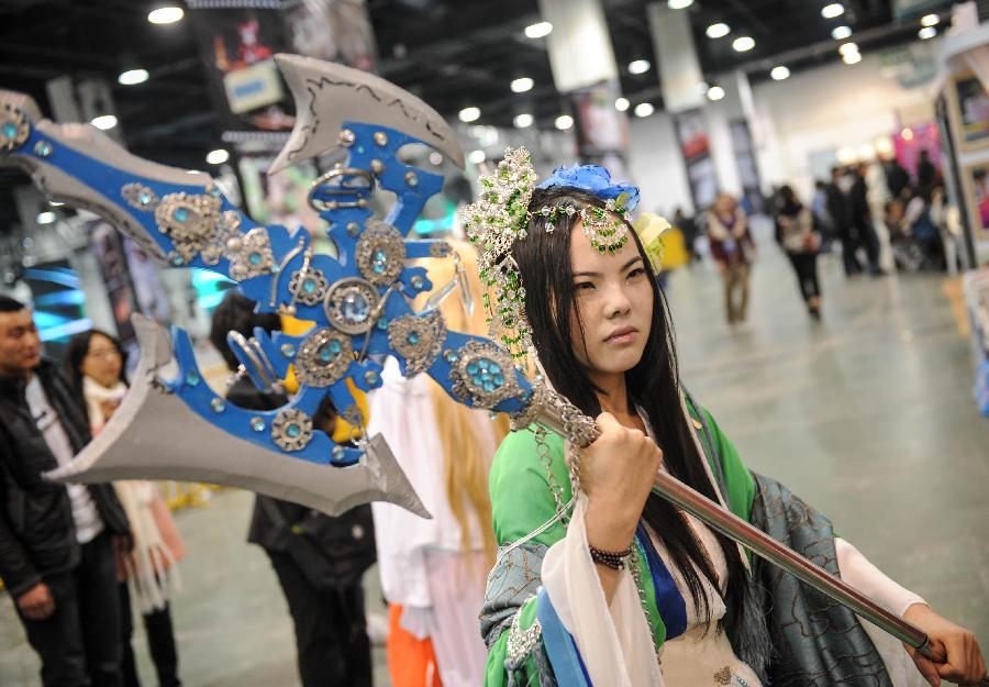 A cosplayer performs during the 1st Cosplay Cultural Festival in Hangzhou, capital of east China's Zhejiang Province, Dec. 9, 2012. The two-day festival closed on Sunday. (Xinhua/Han Chuanhao)