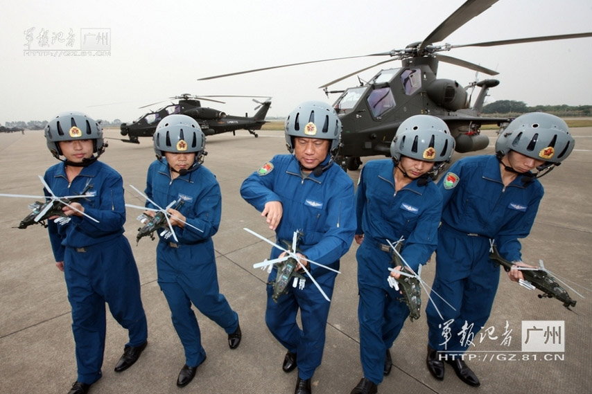 The pilots of China's independently-developed WZ-10 armed helicopters of an army aviation brigade of the Guangzhou Military Area Command (MAC) of the Chinese People's Liberation Army (PLA) are in training. (China Military Online/Li Sanhong)