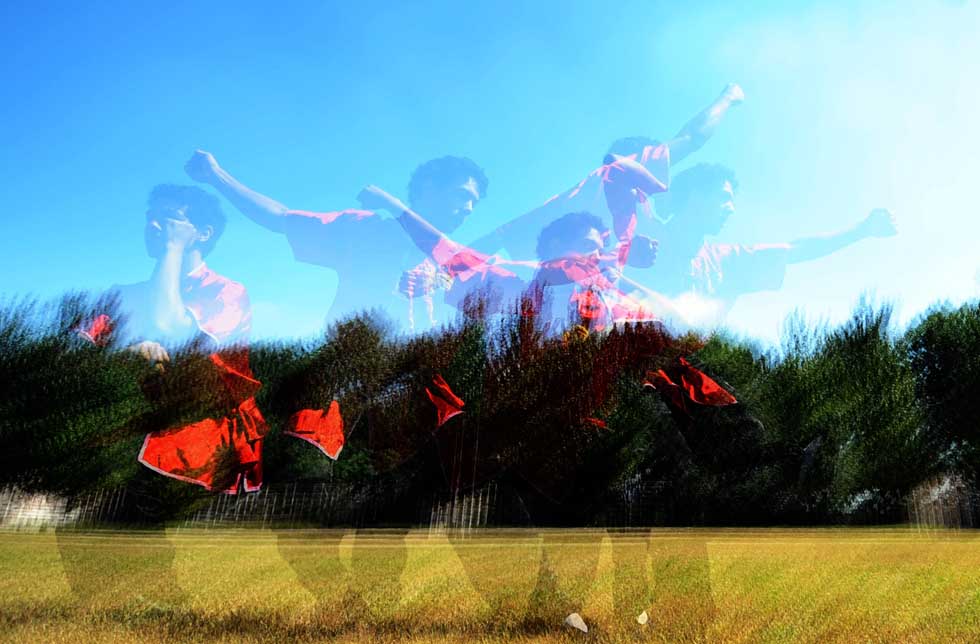The multiple exposure photo shows Mustafaal Share'a practices Chinese martial arts at Shenyang Normal University in Shenyang, capital of northeast China's Liaoning Province, Sept. 15, 2012.(Xinhua/Yang Qing) 