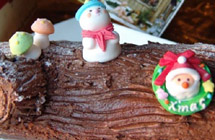 Classic Christmas treats -red velvet yule log cake